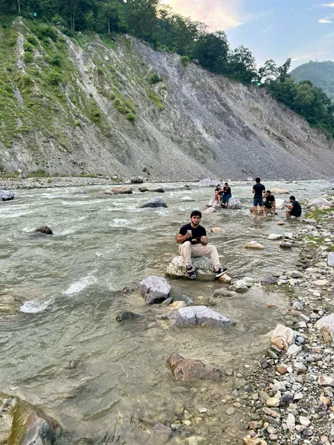 Relaxing on Ganga riverbank